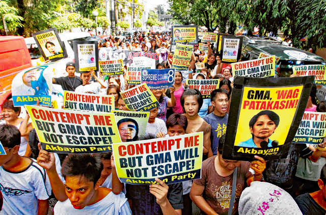 The Filipino people protesting Gloria Macapagal Arroyo